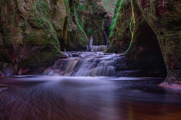 the gorge of glen finnich also known as the devils pulpit in the highlands of scotland.