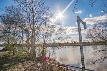 Deserted and beautiful Dyke at the Weser river in Bremen at the sun due to Spread of Coronavirus