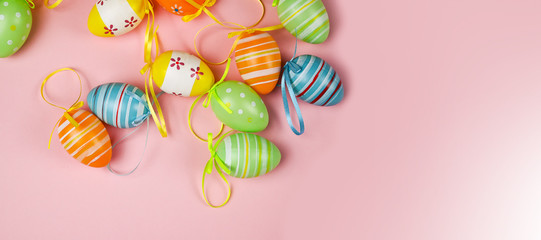 Easter eggs on a pink background