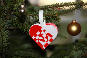 Braided heart with hammer crossed with a sickle, like the flag of the Soviet Union, on Christmas...