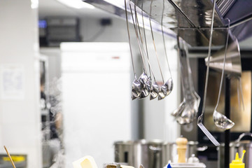 Dishes while cooking in the kitchen in a restaurant. Close-up