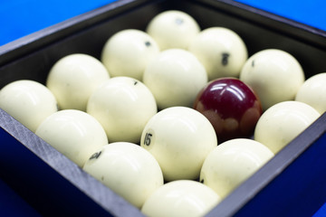 Billiard balls in a wooden box. Sharpness ahead