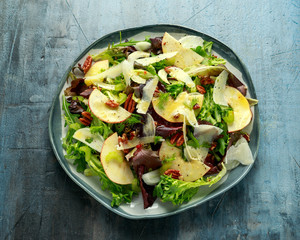 Vegetarian Fennel and apple salad with pecan nuts and Pecorino romano cheese shavings