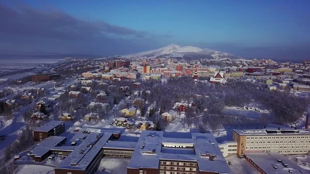 Aerial winter sunny view of Kiruna, the northernmost town in Sweden, province of Lapland, Norrbotten County, footage shot from drone
