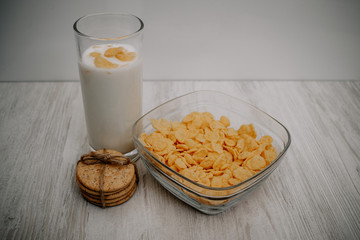 Glass of milk with flakes