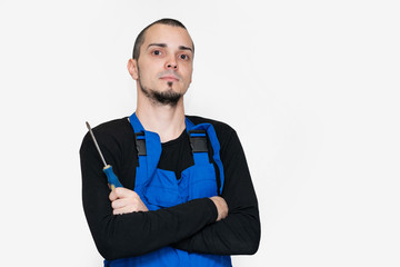 Professional repair, installation and maintenance technician. In a work suit