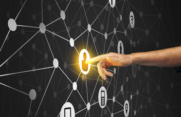 Women hand point to the glowing man icon with digital technology link line icon on dark background,...