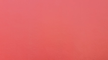 Red concrete wall texture and background