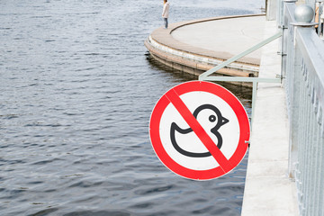 Forbidding sign on the embankment