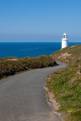 Fototapeta na wymiar road to lighthouse facing the ocean