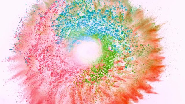 Super slow motion of coloured powder rotation isolated on white background. Filmed on high speed cinema camera, 1000fps.