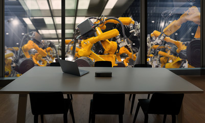 Factory Industrial Engineer office with automation robot arms machine in intelligent factory industrial on real time monitoring system software.Digital future manufacture in meeting room.
