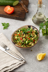 Healthy salad with mung beans, tomatoes, cucumber, lettuce and greens