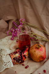 Pomegranate and pomegranate juice. Pomegranate still life