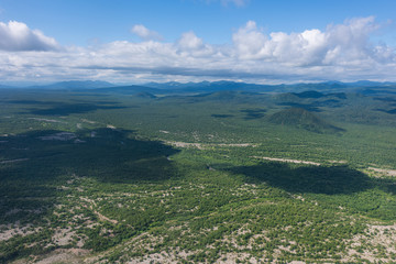aerial view of Kamchatka volcanos, green valleys, snow and ice and the wonderful view of pure nature.