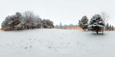 Image with 3D spherical panorama with 360 degree viewing angle. Snowy winter in park with trees at...
