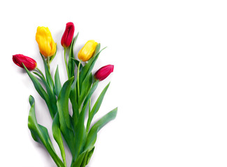Beautiful bouquet of yellow and red tulips on  isolated background