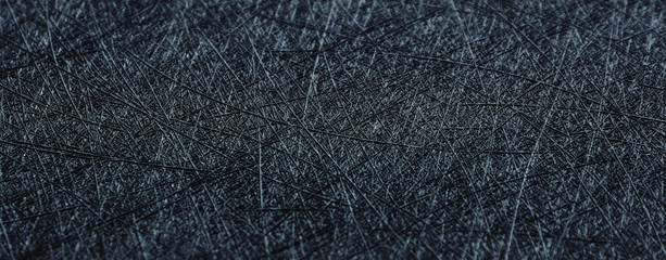 .Abstract background and texture black textural vinyl material. Embossed chaotic stripes. Banner..