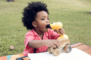 An african boy in backyard