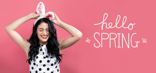 Hello spring message with young woman with Easter theme