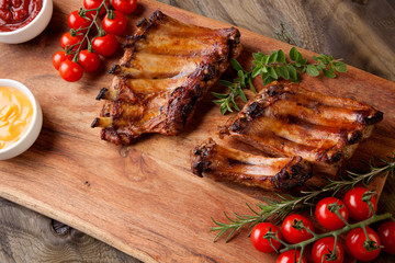 Grilled Pork Ribs On Wooden Board