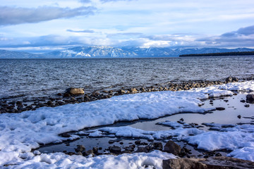 Beach covered by snow along the Lake Tahoe in California