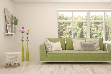 White living room with sofa and summer landscape in window. Scandinavian interior design. 3D illustration