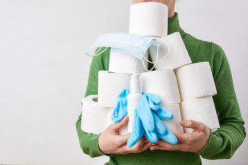 Woman storing tissue toilet paper during Coronavirus. Concept of Covid-19 quarantine. Doomsday...