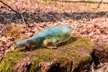 an old bottle with a cork stopper inside