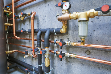 Plumbing service. copper pipeline of a heating system in boiler room