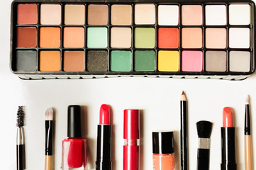 Makeup cosmetics tools background and beauty cosmetics. Isolated cosmetics products and facial cosmetics package lipstick, eyeshadow