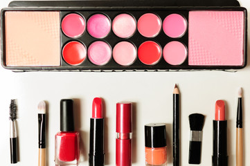 Makeup cosmetics tools background and beauty cosmetics. Isolated cosmetics products and facial cosmetics package lipstick, eyeshadow