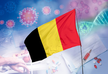 Coronavirus (COVID-19) outbreak and coronaviruses influenza background as dangerous flu strain cases as a pandemic medical health risk. Belgium Flag with corona virus and their prevention.