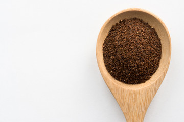 Ground Cloves on a Wood Spoon