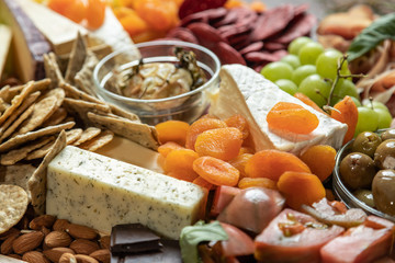 Close up Top Down Gourmet Charcuterie Board. Flat Lay with Selective focus.