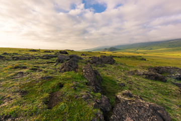 Fototapeta na wymiar Dramatic views of the volcanic landscape. Kamchatka Peninsula.