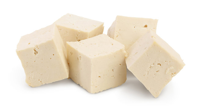 Heap of diced tofu cheese isolated on white background with clipping path and full depth of field,