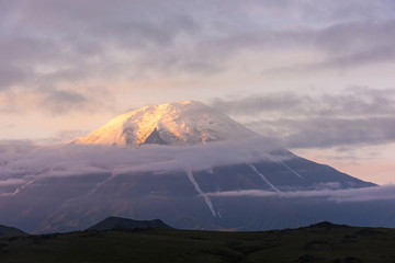 Tolbachik volcano reflection in the quiet mountain lake, Kamchatka