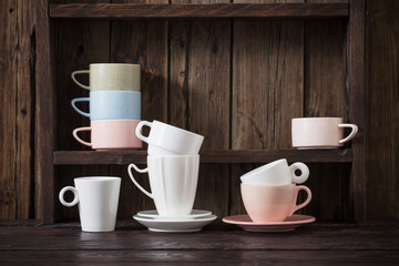  kitchen dishware on old dark wooden background