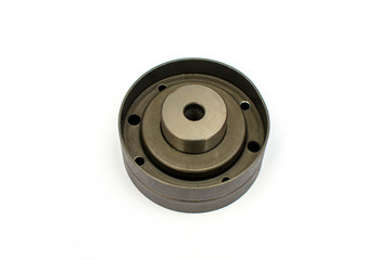 Car belt tensioner isolated on the white background. Spare parts.