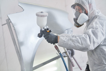 car painting in chamber. automobile repair service