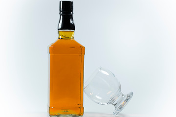 Whiskey bottle and cross-standing glass based on the bottle. ,