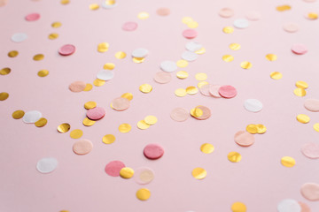 pink and gold round confetti on a pink pastel background. Template for advertising, blog, discounts and text