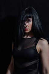 Fototapeta premium woman posing on black background