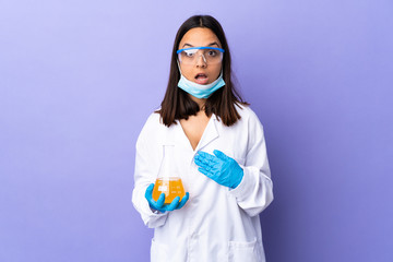 Scientist woman investigating a vaccine to cure coronavirus disease pointing to oneself