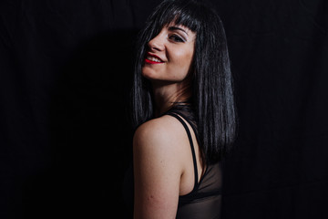 Fototapeta premium woman posing on black background