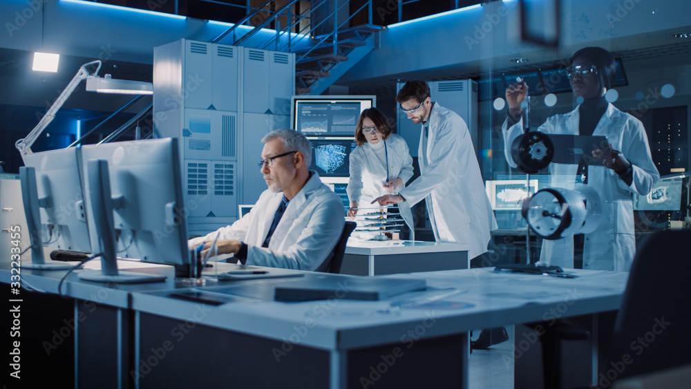 Poster diverse international team of industrial scientists and engineers wearing white coats working on ind