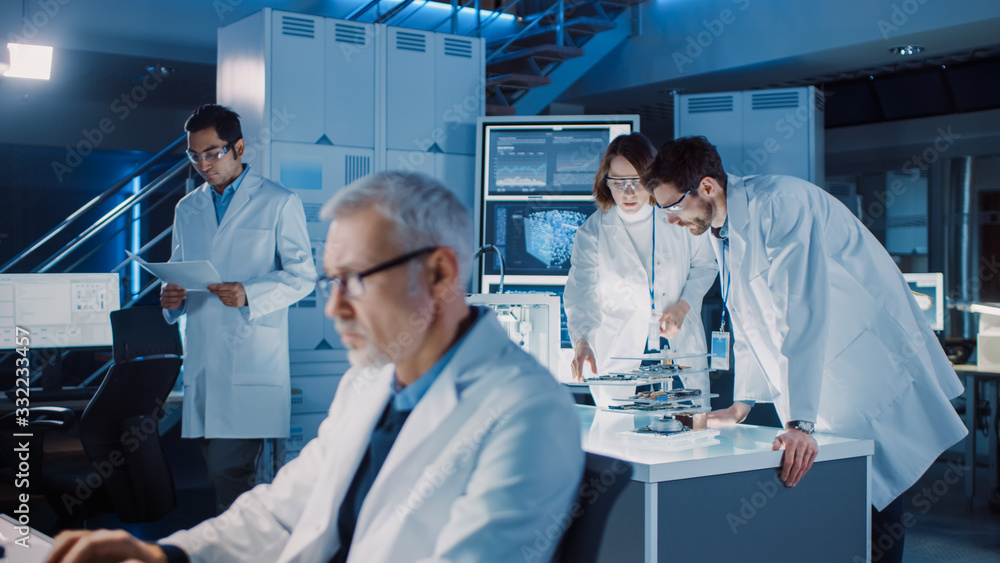Poster Diverse International Team of Industrial Scientists and Engineers Wearing White Coats Working on Heavy Machinery Design in Research Laboratory. Professionals Using 3D Printer, Computers and Microscope