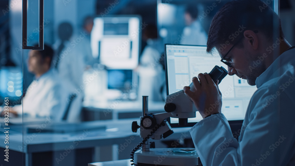 Aufkleber in technology research laboratory: diverse team of industrial scientists, engineers, developers gath
