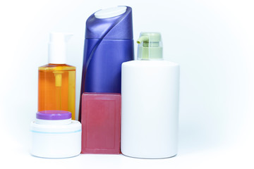 Shampoo bottles close-up. White background. A photo was taken in the studio.